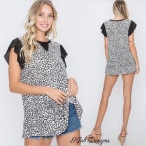 HEIMISH USA Black and White Animal Print Blouse